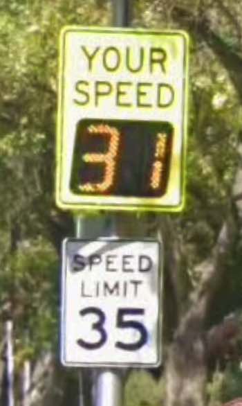 A photo of a speed limit sign showing your speed